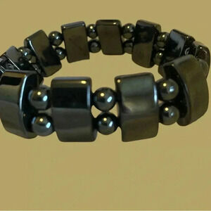 Chunky black bracelet,  Source unknown